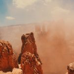 Sand Storm And Rock Formation