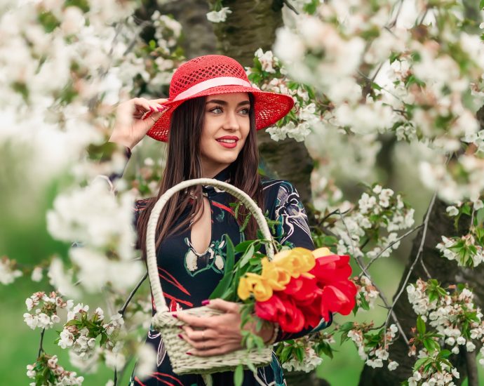 Woman Posing in Cherry Flowers