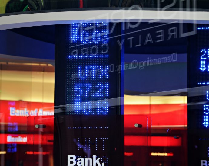 a bank sign in front of a building
