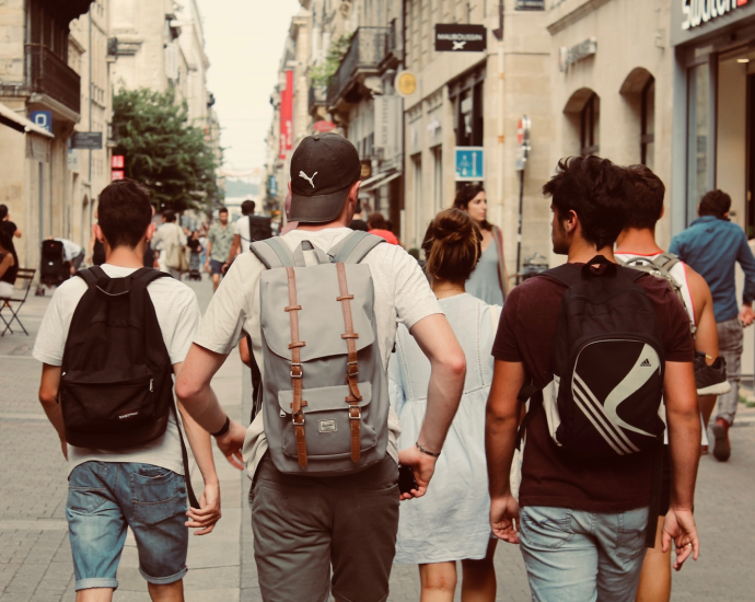 group of people walking on street during daytime