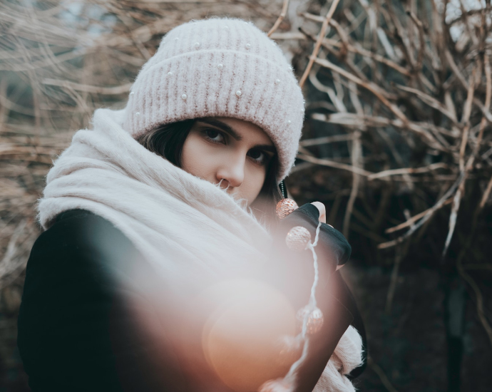 woman wearing gray knit hat