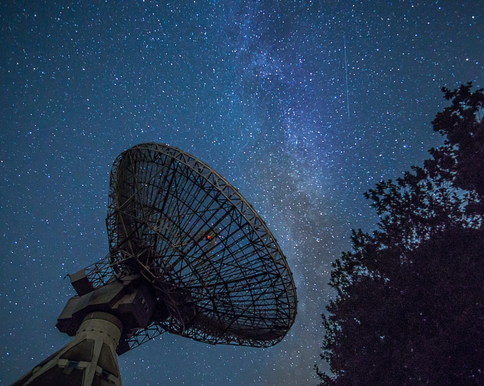 white satellite dish under blue sky during night time