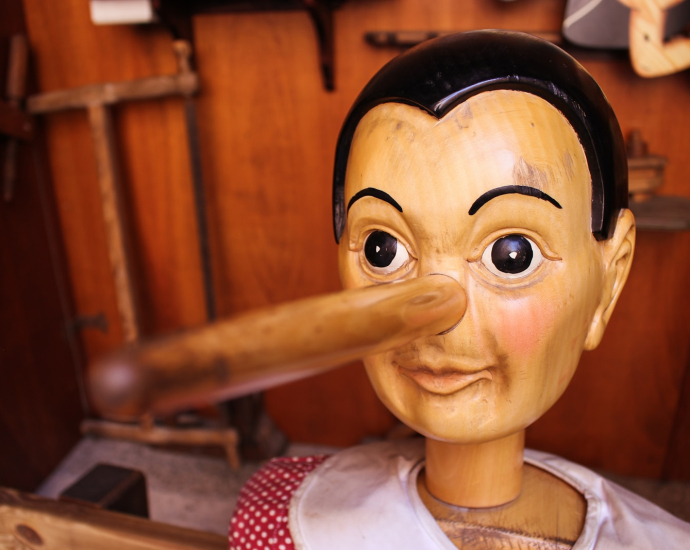 selective focus photography of Pinocchio puppet