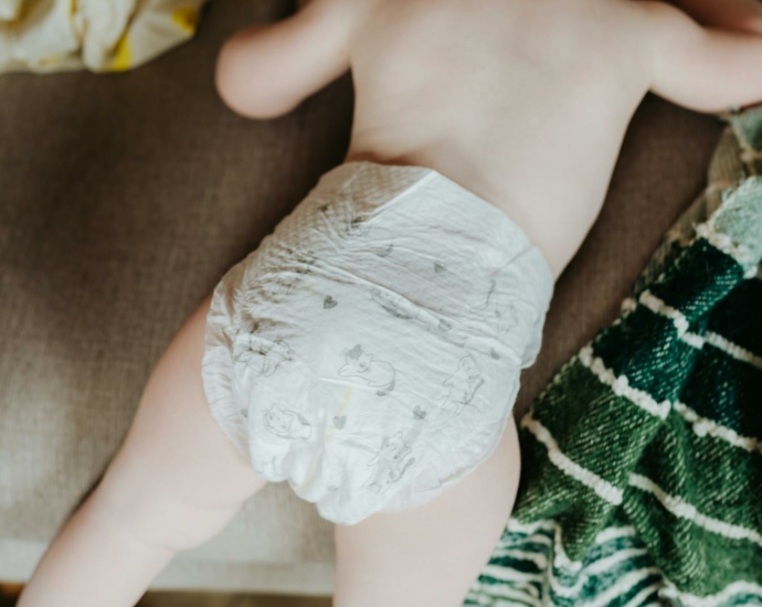 Close Up Photo of a Baby Wearing Diaper