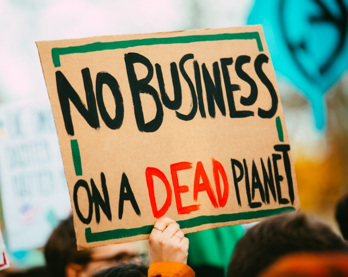 no business on a dead planet sign