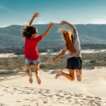Jump Shot Photography of Two Women
