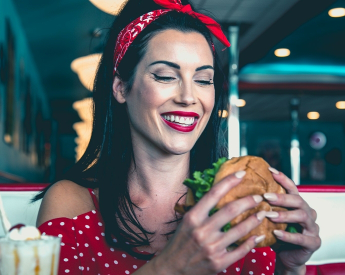 woman eats burger