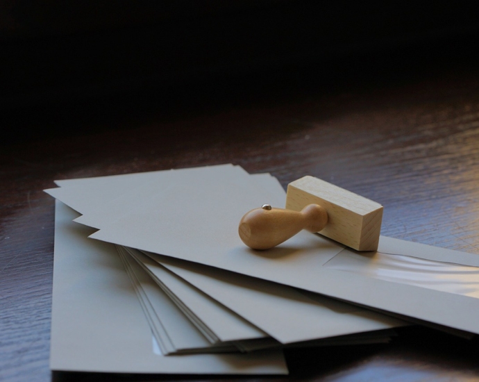 envelopes, letters, wooden stamp