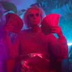 Photo of an Elderly Woman Holding Money