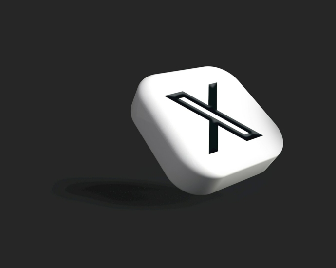 a white dice with a black x on it