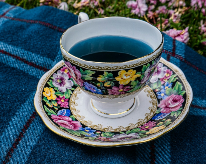 a cup of tea sitting on top of a saucer