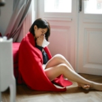 Woman Sitting on Floor