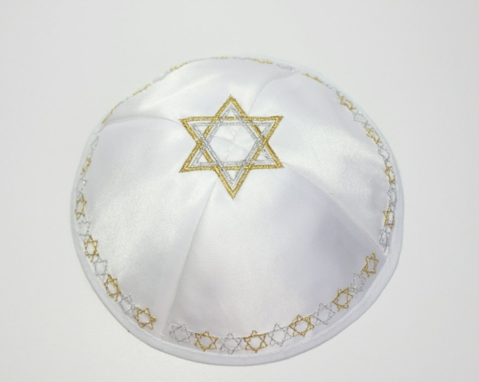 a white hat with a gold star of david on it