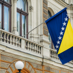 blue and yellow flag near door