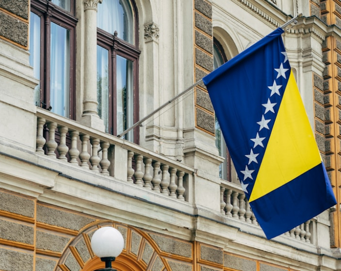 blue and yellow flag near door