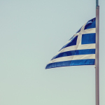 blue and white striped flag on pole