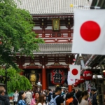 people standing beside building