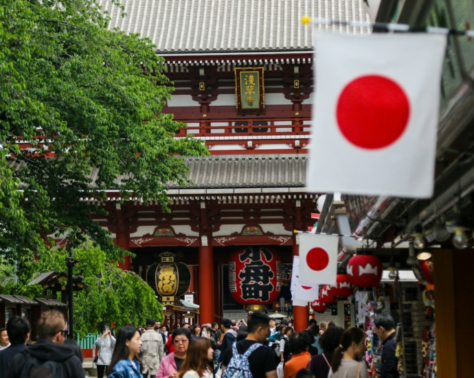 people standing beside building