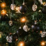 a close up of a christmas tree with ornaments