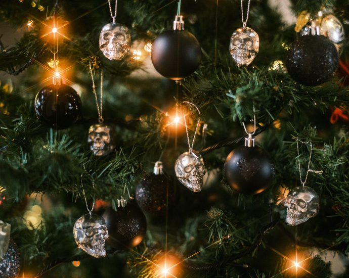 a close up of a christmas tree with ornaments