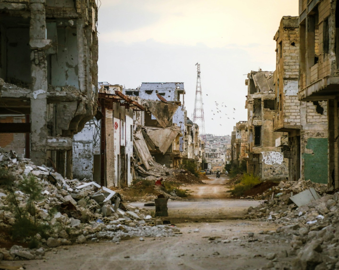 a destroyed building in a city