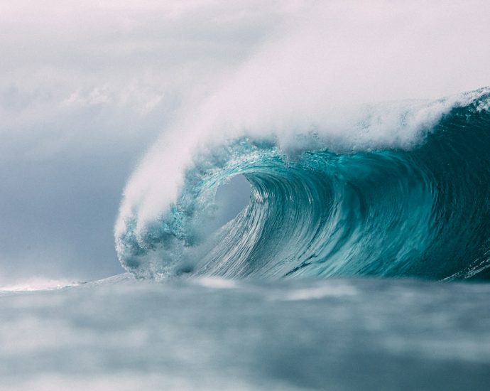 white and blue ocean waves