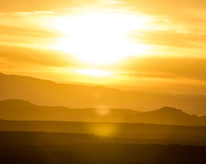 silhouette of mountains during golden hour