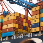 a large cargo ship loaded with lots of containers