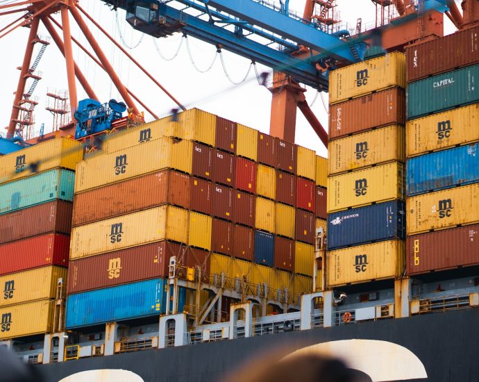 a large cargo ship loaded with lots of containers