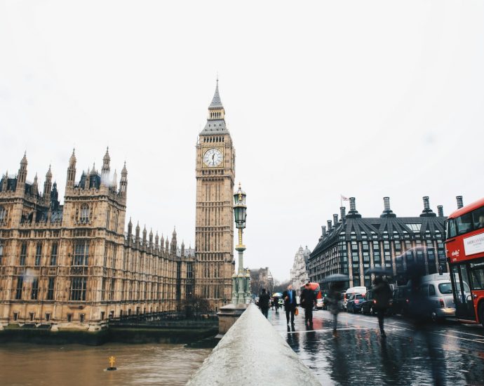 people near Big Ben in London