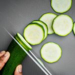 sliced cucumber on black textile