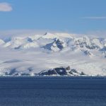 snow covered mountain during daytime