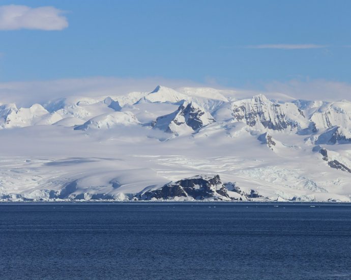 snow covered mountain during daytime
