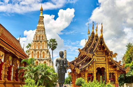 standing statue and temples landmark during daytime