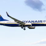 white and blue plane