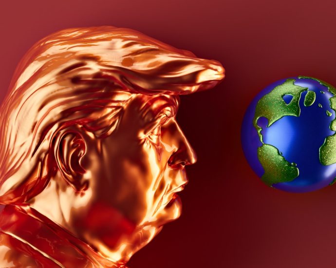 A golden trump looks at planet earth.