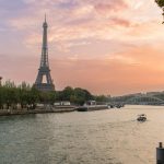 The eiffel tower towering over the city of paris