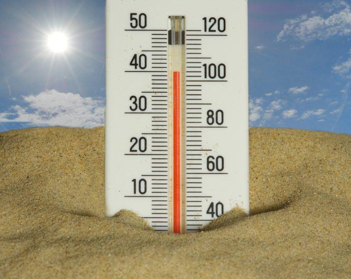 The thermometer shows a very hot temperature.