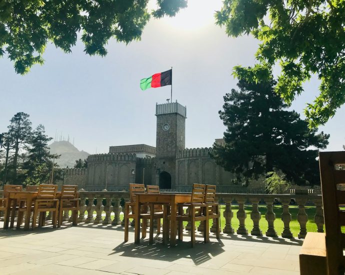 a large building with a flag on top of it