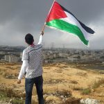 man waving flag