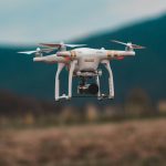selective focus photography of DJI Phantom 3 Professional quadcopter drone