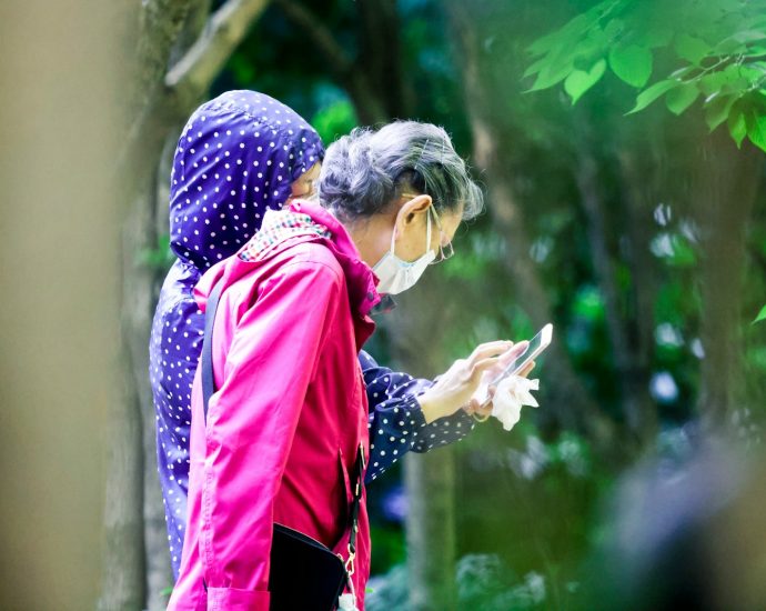 a man and woman in garment