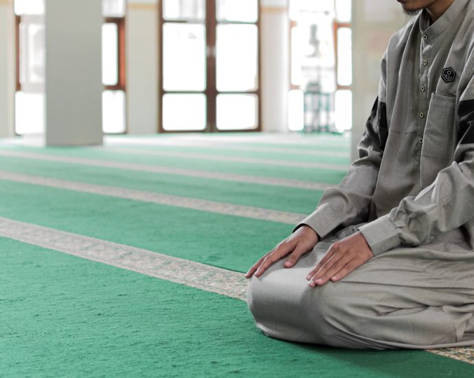 a man sitting on the floor