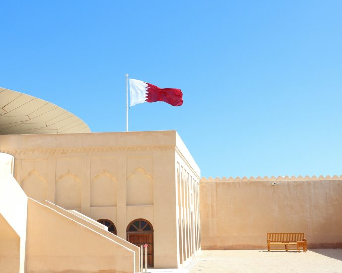 A building with a flag on top of it