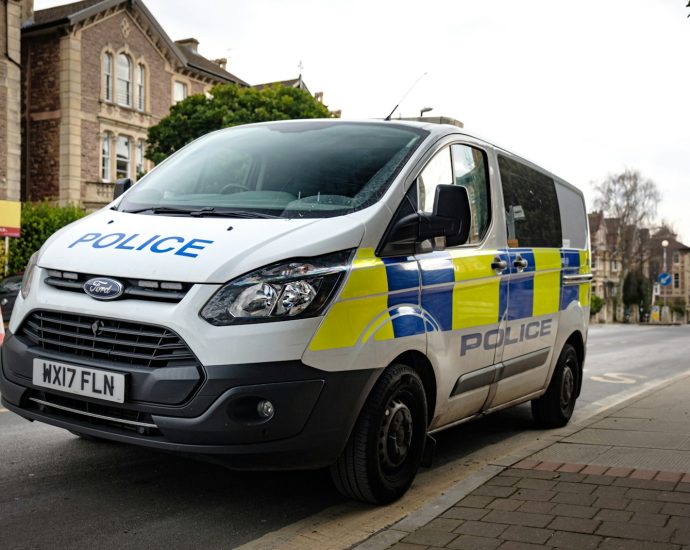 white and blue police car