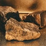 a couple of rocks sitting on top of a table