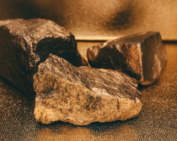 a couple of rocks sitting on top of a table