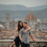 Couple embracing with florence cityscape background