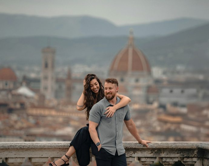 Couple embracing with florence cityscape background