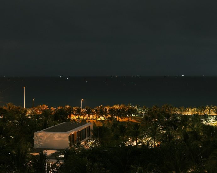 Distant lights on the ocean at night.